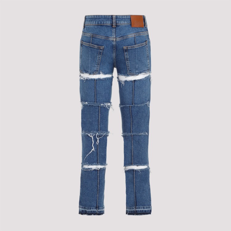 Alexander Mcqueen Low-rise Distressed Jeans In Blue