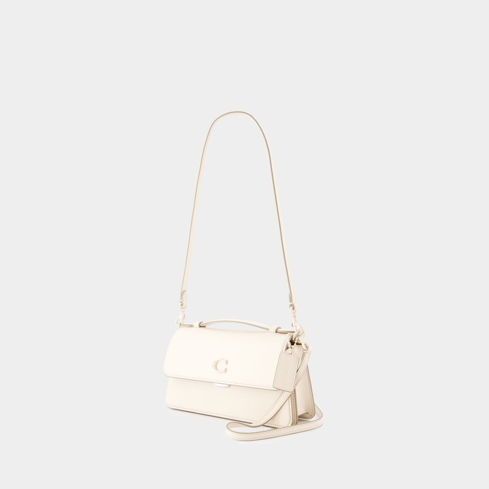 Shop Coach Juno Crossbody - Leather - Beige In Neutrals