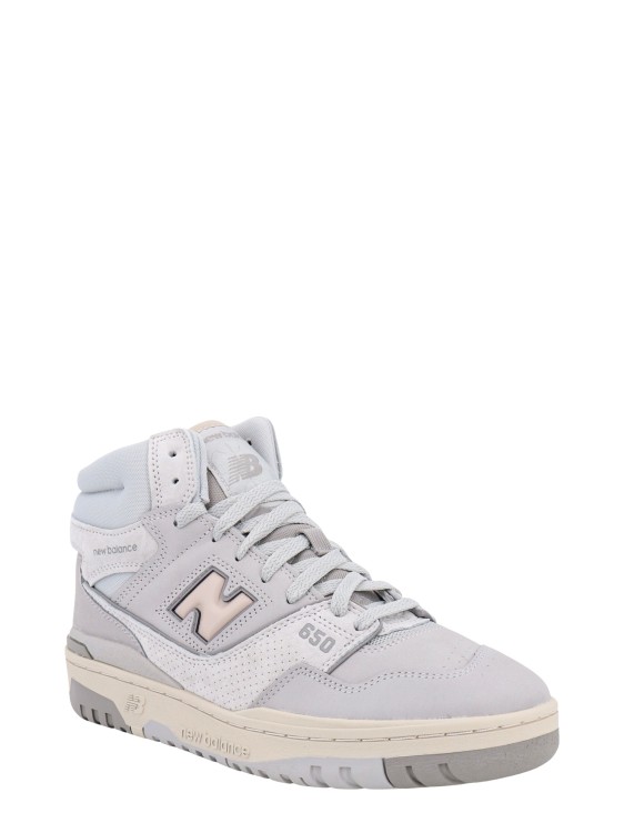 Shop New Balance 650 Leather Sneakers In White