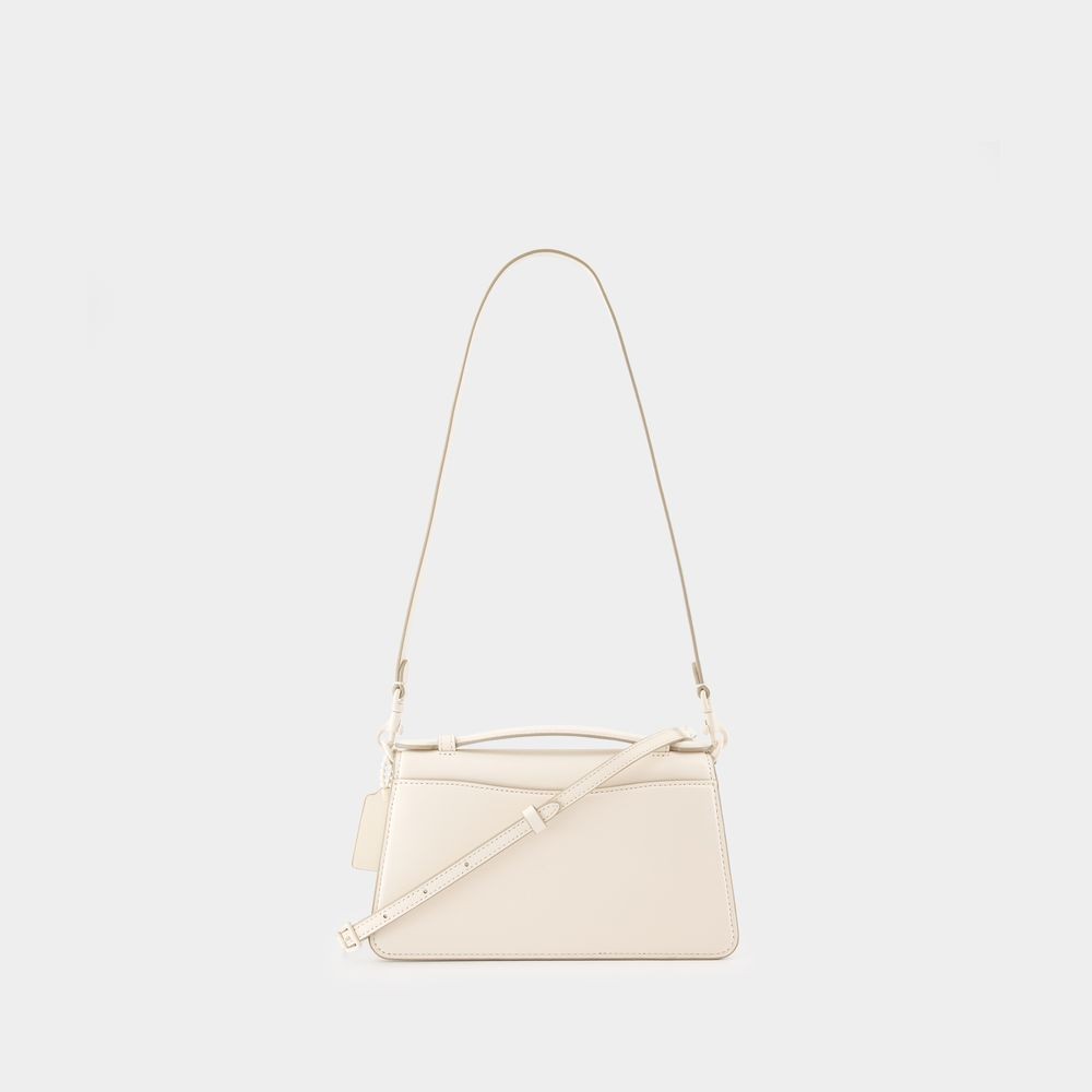 Shop Coach Juno Crossbody - Leather - Beige In Neutrals