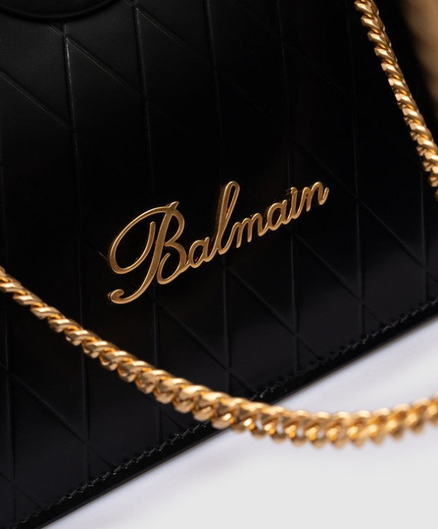 Shop Balmain Grid-embossed Leather Clutch Bag In Black