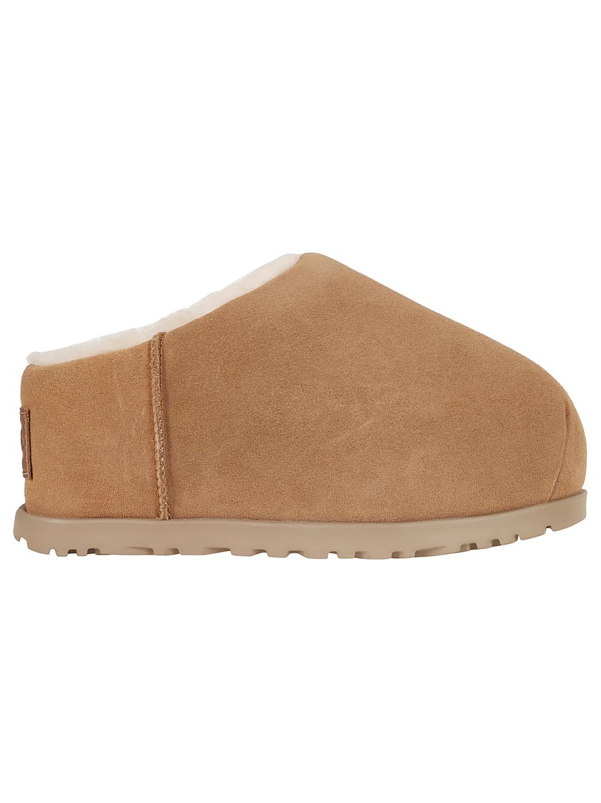 Ugg Luxurious Sheepskin Slippers With Plush Interior For Ultimate Comfort In Brown