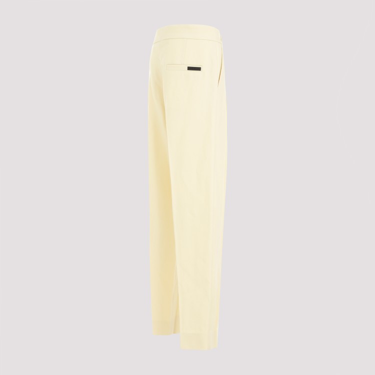 Fear Of God Single Pleat Tapered Cream Wool Trousers In Yellow