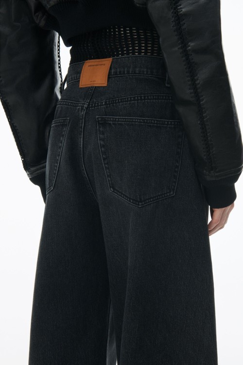 Shop Alexander Wang Low-rise Wide-leg Denim Jeans In Black