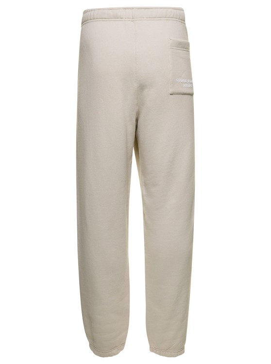 Shop Stone Island White Jogger Pants With Contrasting Logo Embroidery In Cotton