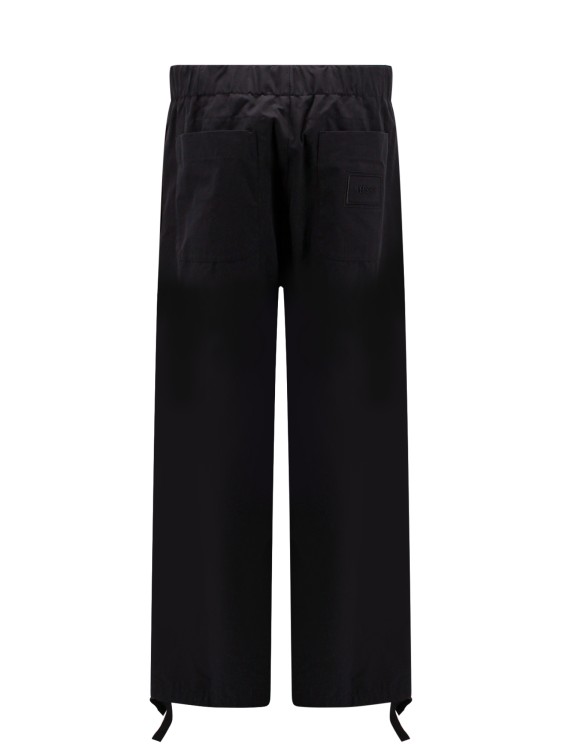 Shop Versace Back Embroidered Logo Cotton Trouser In Black