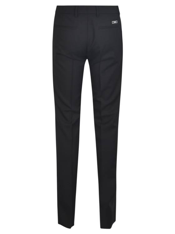 Shop Versace Slim-cut Wool Trousers In Black