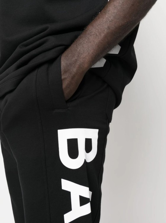 Shop Balmain Black Vert-logo Pants