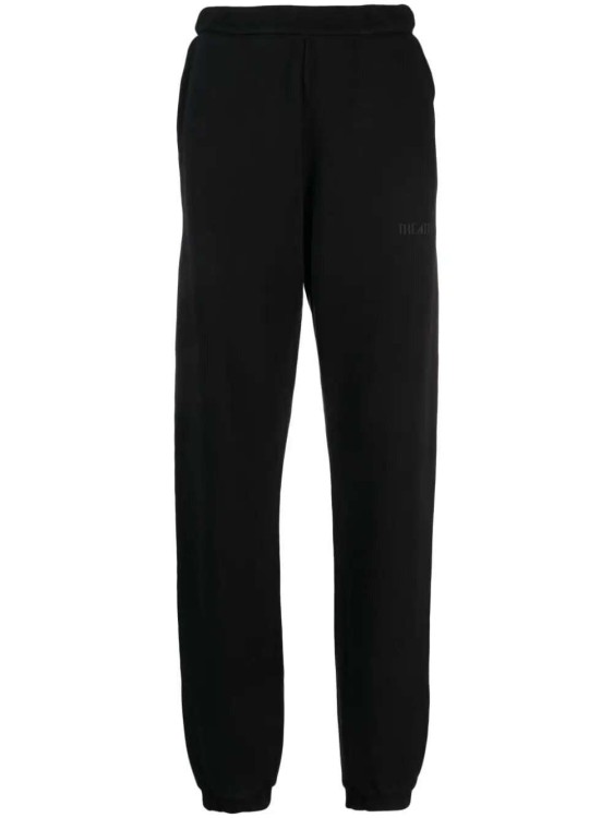 Shop Attico Penny Logo-embossed Cotton Track Pants In Black