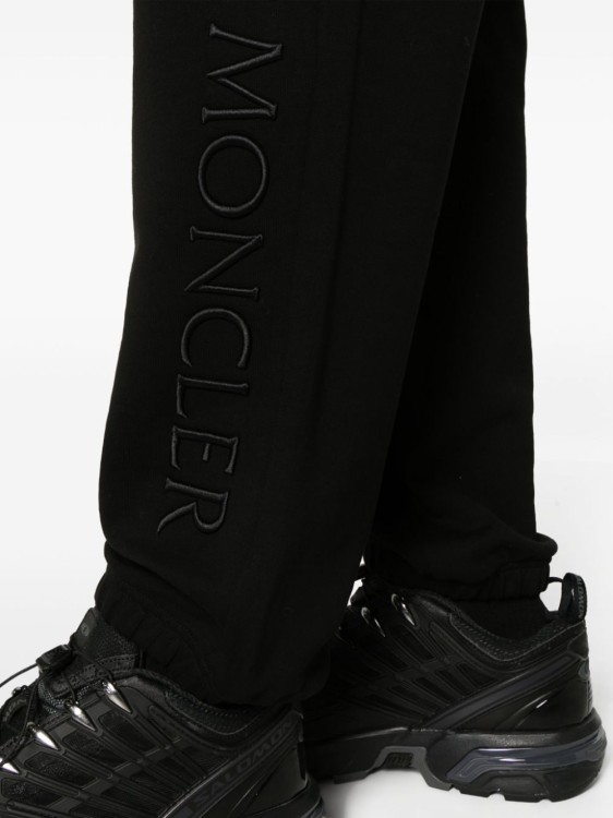 Shop Moncler Embroidered Logo Trousers In Black