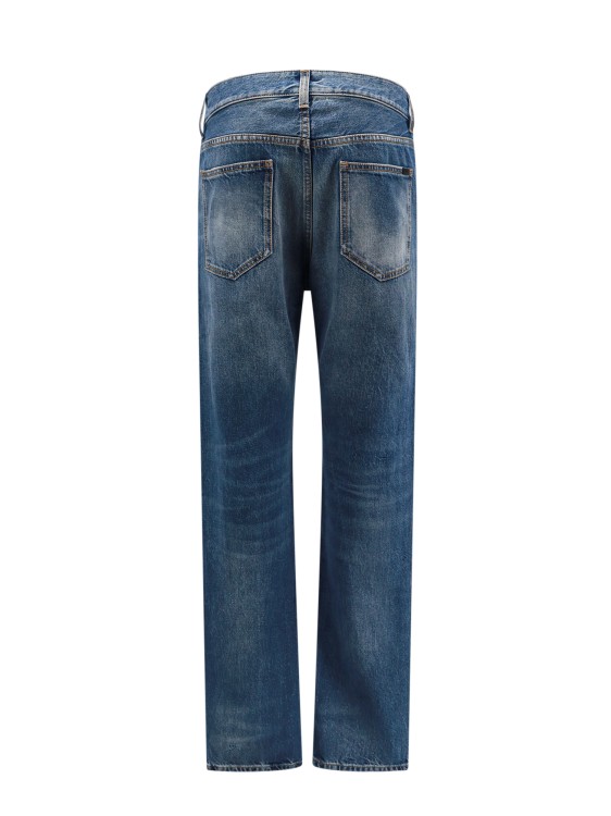 Shop Saint Laurent Biologic Cotton Jeans With Back Logo Patch In Blue