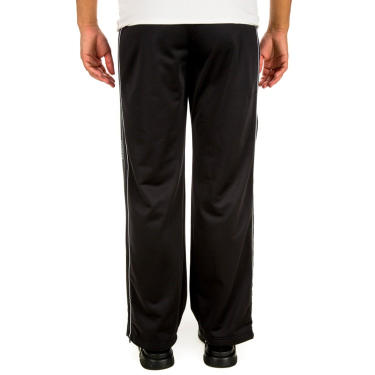 Shop Balenciaga Jogging Logo Pants In Black