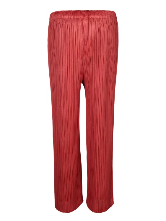 Shop Issey Miyake Pleated Trousers In Red
