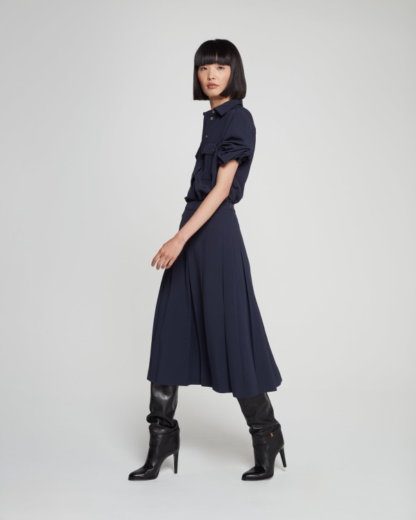 Shop Serena Bute Pleated Midi Skirt - Dark Navy In Blue