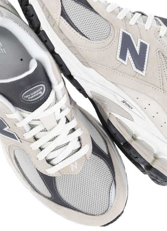 Shop New Balance 2002 R Sneakers In White