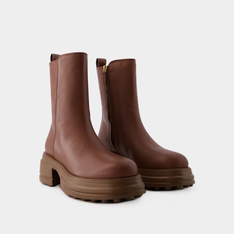 Shop Tod's Rubber Tronchetto Boots - Leather - Brown In Black