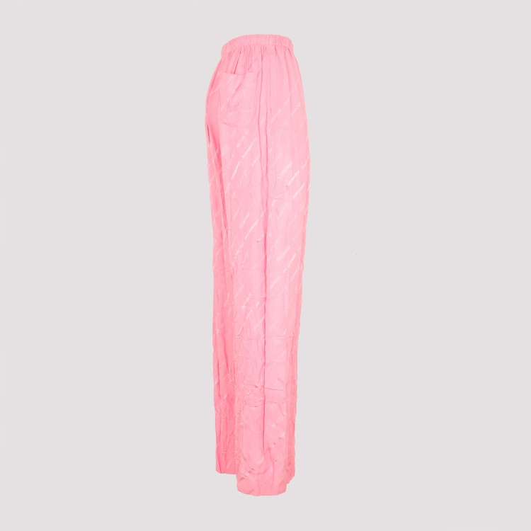 Shop Balenciaga Pink Silk Logoed Pants