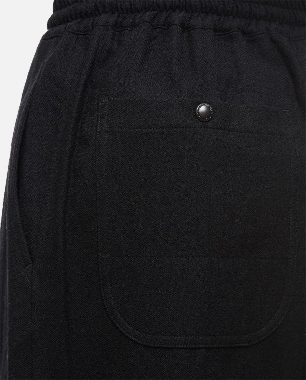 Shop Junya Watanabe Loose Fit Trousers In Black