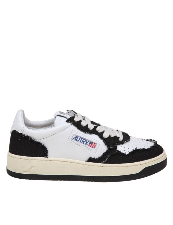 Shop Autry Sneakers In Black And White Leather And Canvas