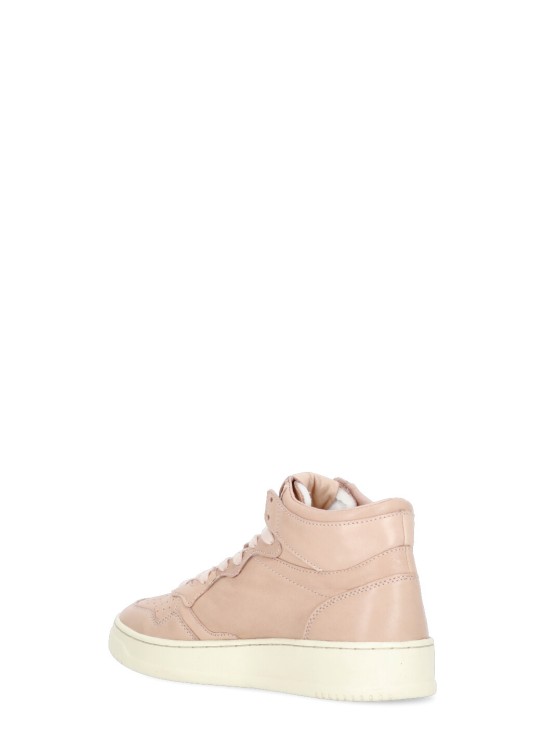 Shop Autry Medalist Mid Sneakers In Pink