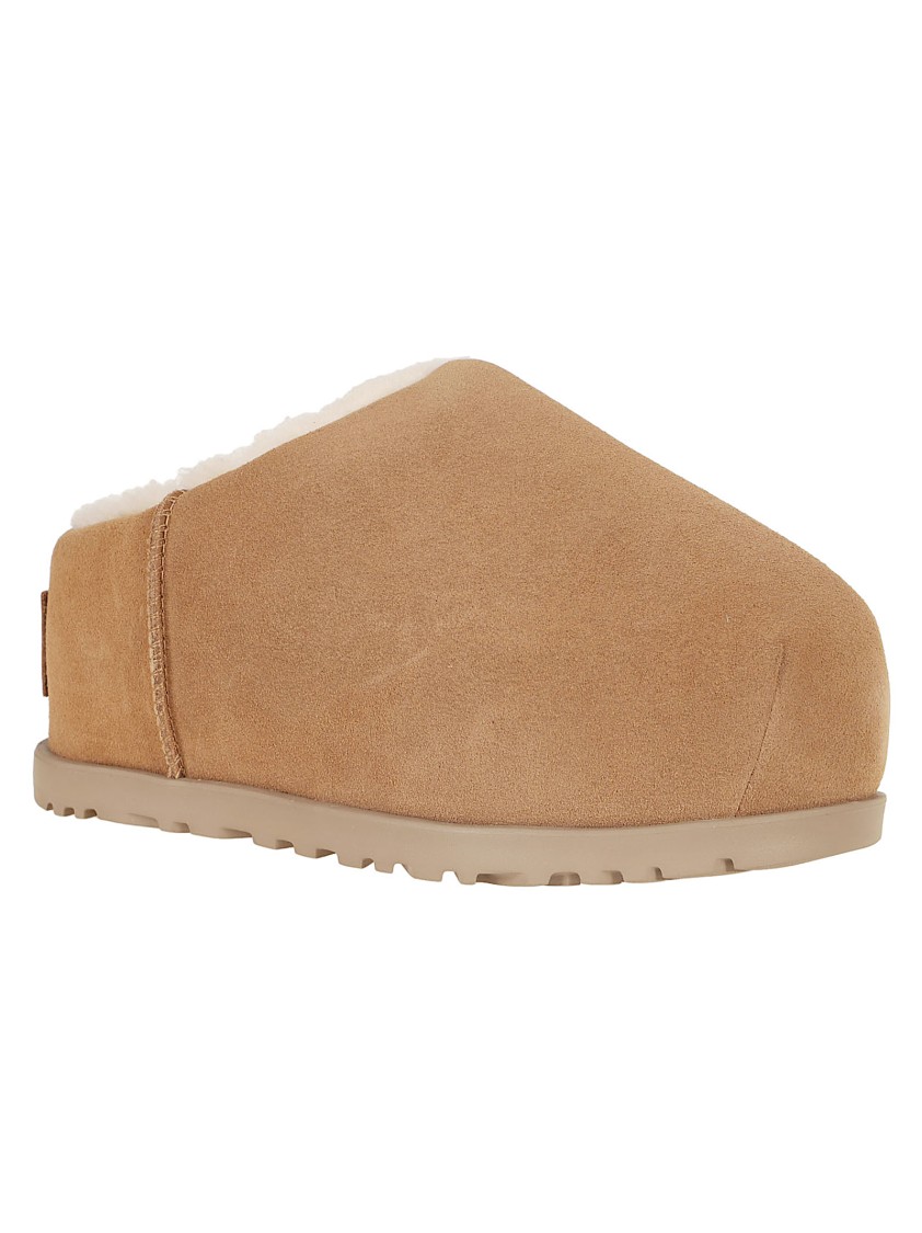 Ugg Luxurious Sheepskin Slippers With Plush Interior For Ultimate Comfort In Brown